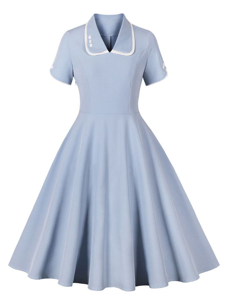 1950s Lapel Buttoned Short Sleeve Solid Dress — a 1950s silhouette that turns sidewalks into runways