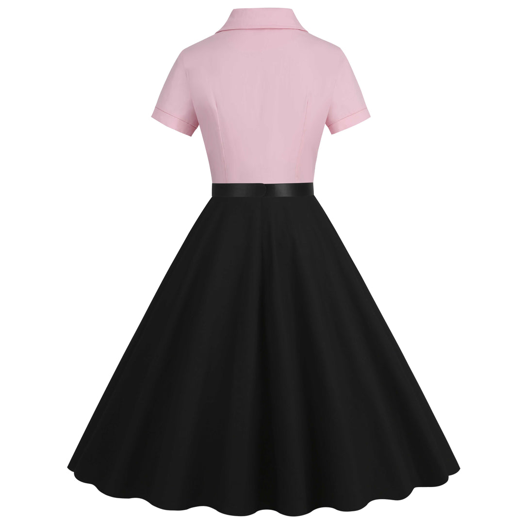 This 1950s Lapel Contrast Belted Dress wraps her in 1950s elegance, one twirl at a time