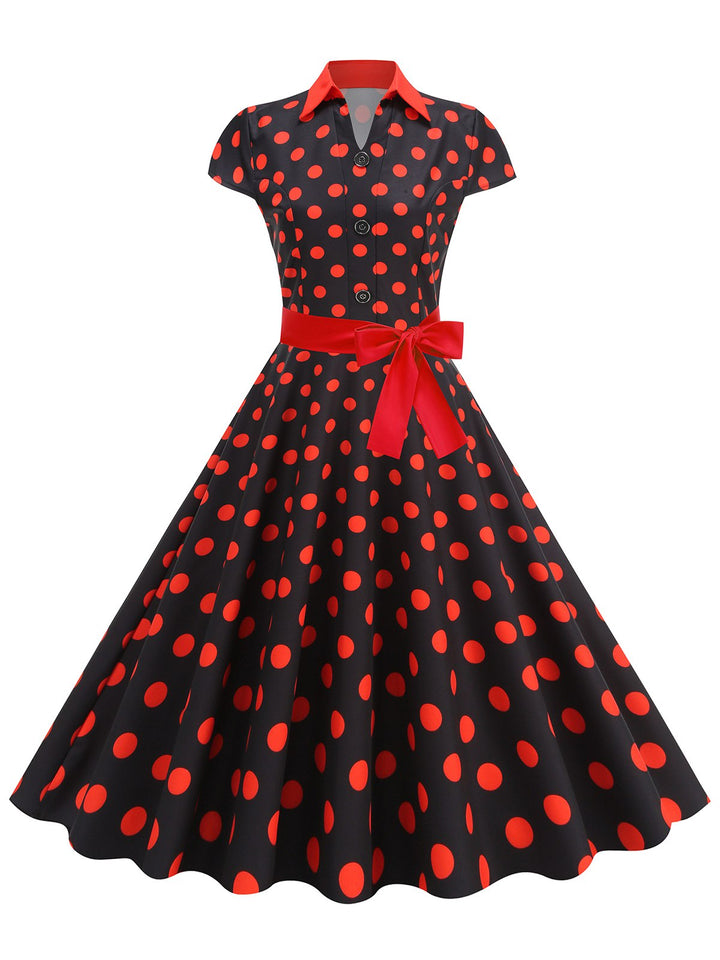 She slips into this 1950s Lapel Polka Dots Bow Swing Dress and suddenly it&