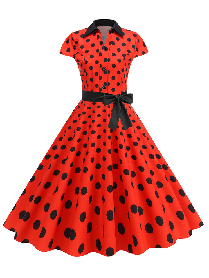 She slips into this 1950s Lapel Polka Dots Bow Swing Dress and suddenly it&