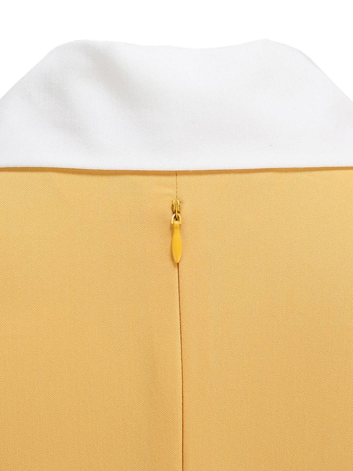 She slips into this 1950s Notched Collar Colorblock Swing Dress and suddenly it&