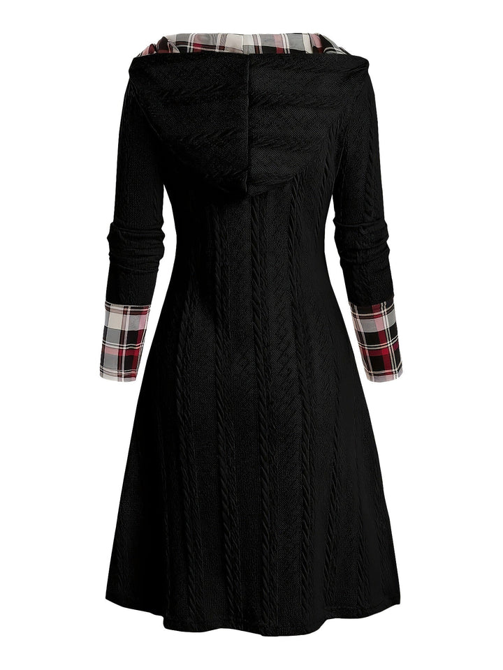 She slips into this 1950s Plaid Knit Hooded Dress and suddenly it&