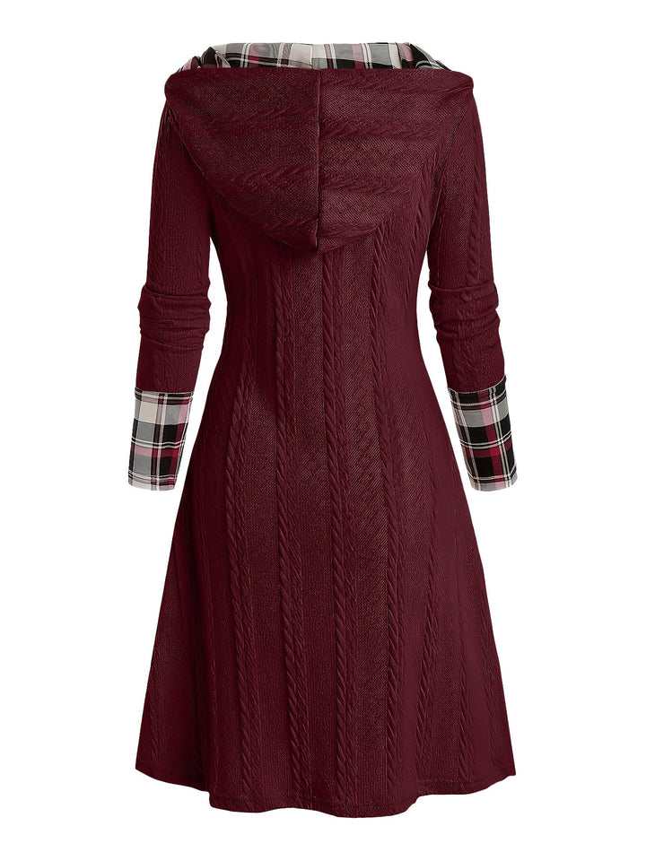 This 1950s Plaid Knit Hooded Dress wraps her in 1950s elegance, one twirl at a time