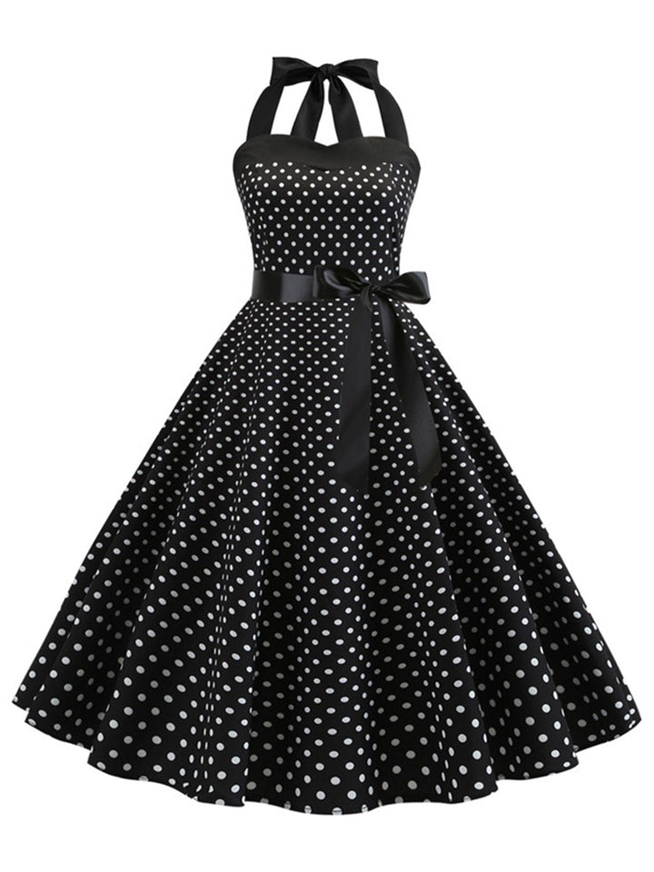 1950s Polka Dot Bow Tie Halter Swing Dress — a 1950s silhouette that turns sidewalks into runways