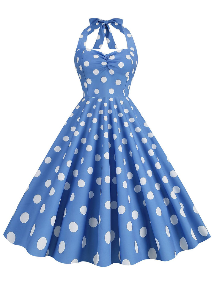 She slips into this 1950s Polka Dot Halter Swing Dress and suddenly it&