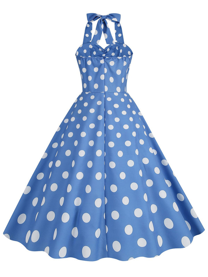 This 1950s Polka Dot Halter Swing Dress wraps her in 1950s elegance, one twirl at a time