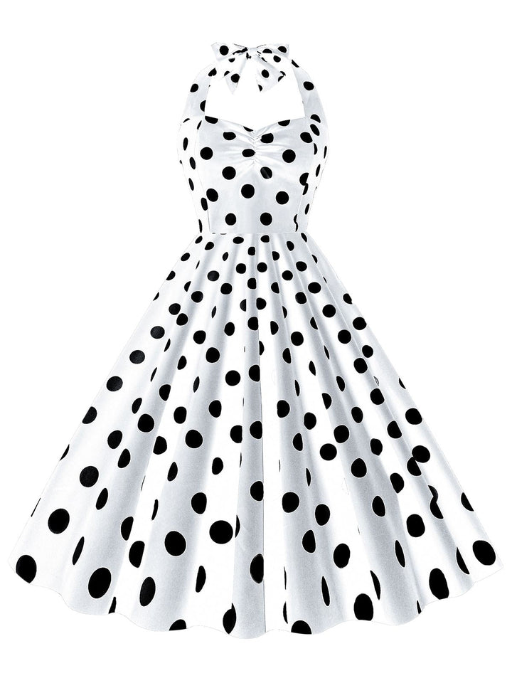 She slips into this 1950s Polka Dot Halter Swing Dress and suddenly it&