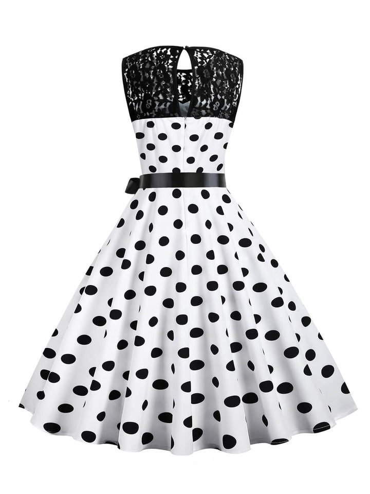 This 1950s Polka Dot Lace Patchwork Dress wraps her in 1950s elegance, one twirl at a time