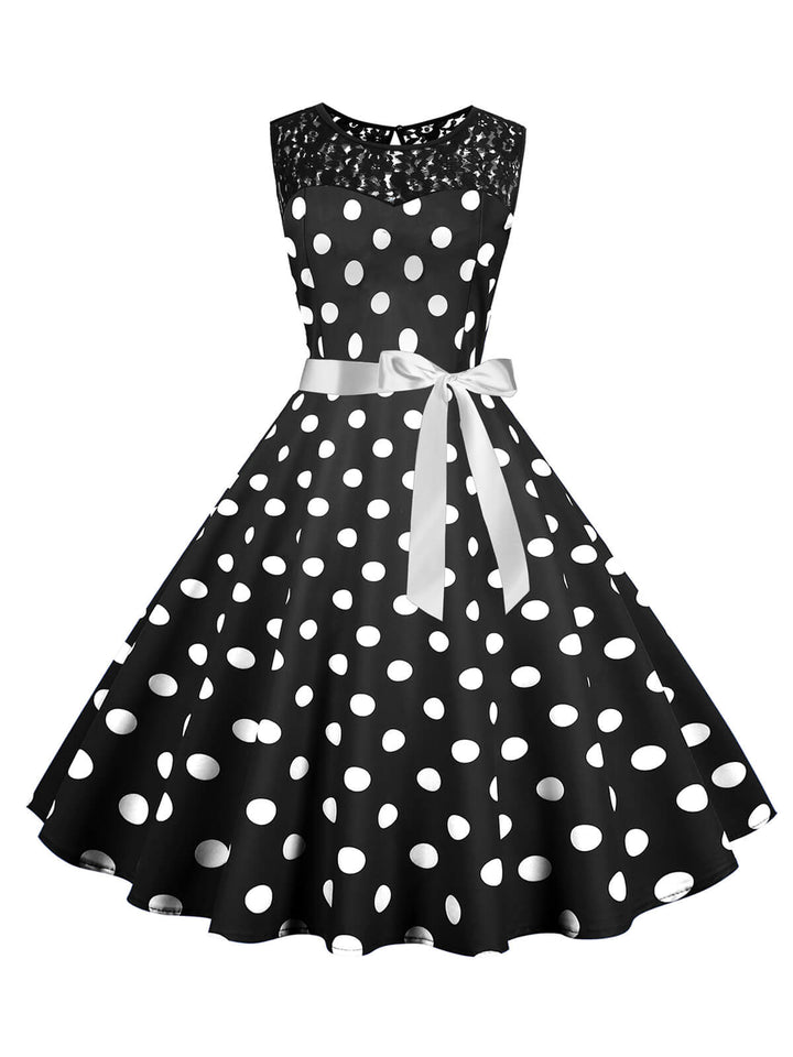 She slips into this 1950s Polka Dot Lace Patchwork Dress and suddenly it&