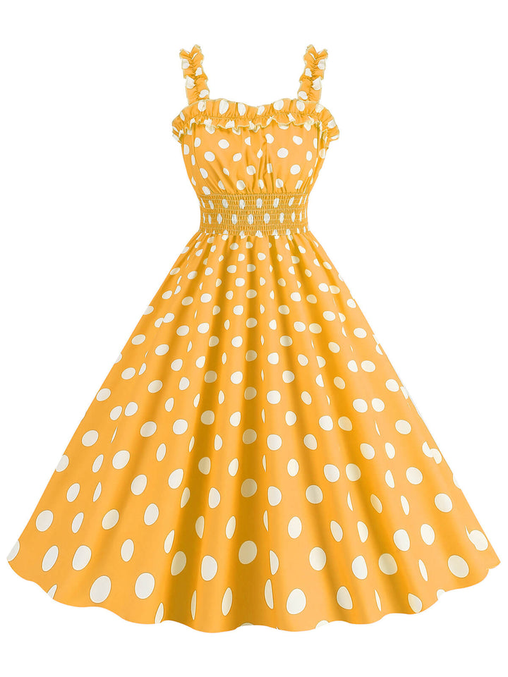 She slips into this 1950s Polka Dot Smocking Strap Dress and suddenly it&