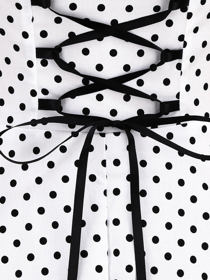 1950s Polka Dots Lace Up Halter Swing Dress — the kind of 1950s dress that makes strangers smile