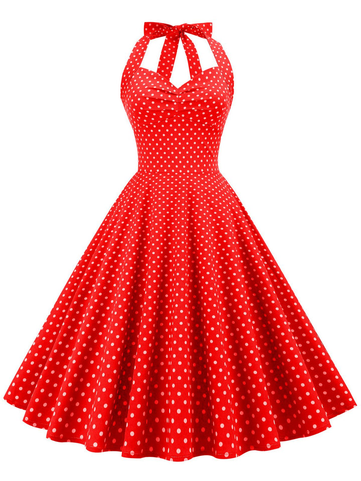 She slips into this 1950s Polka Dots Lace Up Halter Swing Dress and suddenly it&