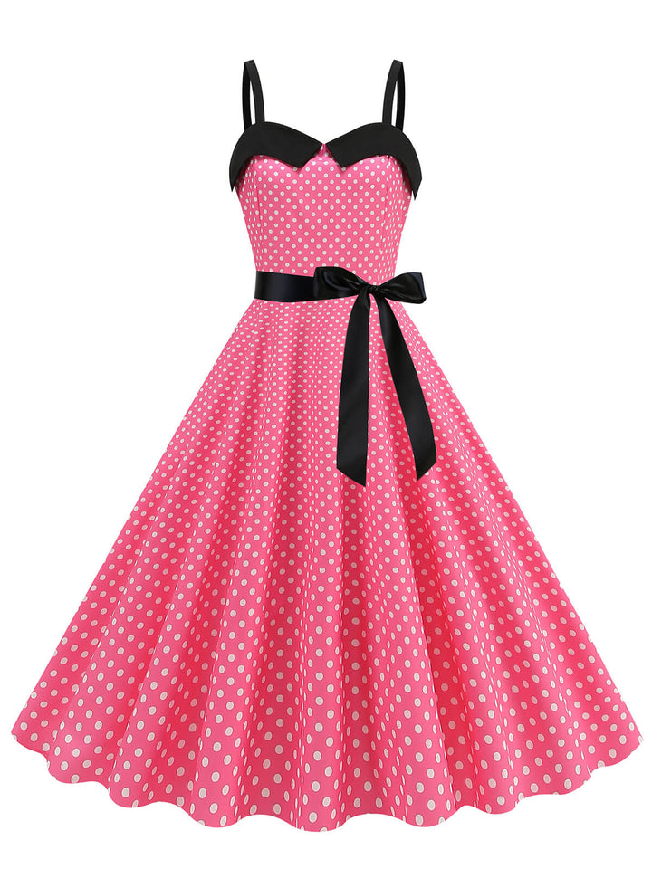 She slips into this 1950s Polka Dots Patchwork Ribbon Strap Dress and suddenly it&