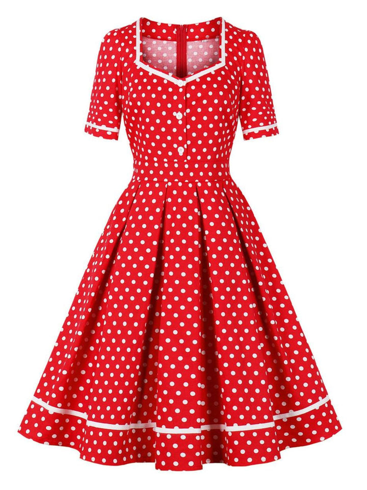 She slips into this 1950s Polka Dots Patchwork Swing Dress and suddenly it&