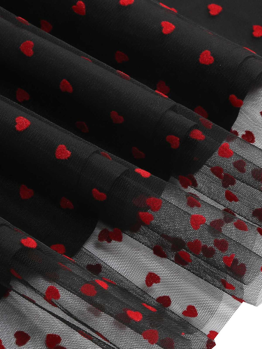 This 1950s Puff Sleeve Valentine Heart Mesh Dress wraps her in 1950s elegance, one twirl at a time