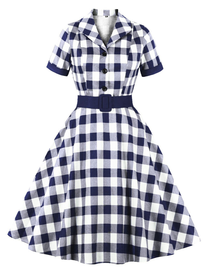 She slips into this 1950s Retro Contrast Short-Sleeved Lapel Dress and suddenly it&
