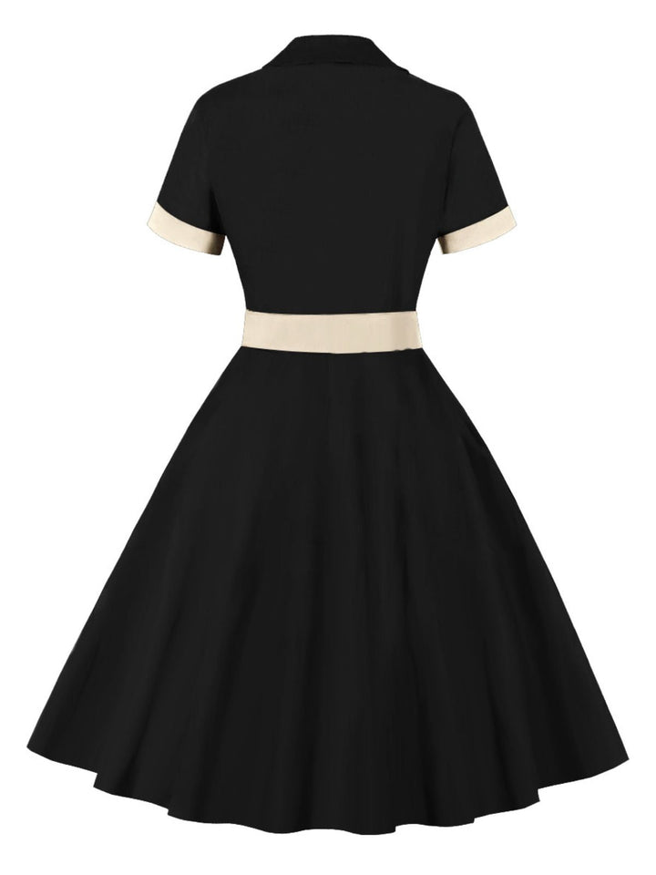She slips into this 1950s Retro Contrast Short-Sleeved Lapel Dress and suddenly it&