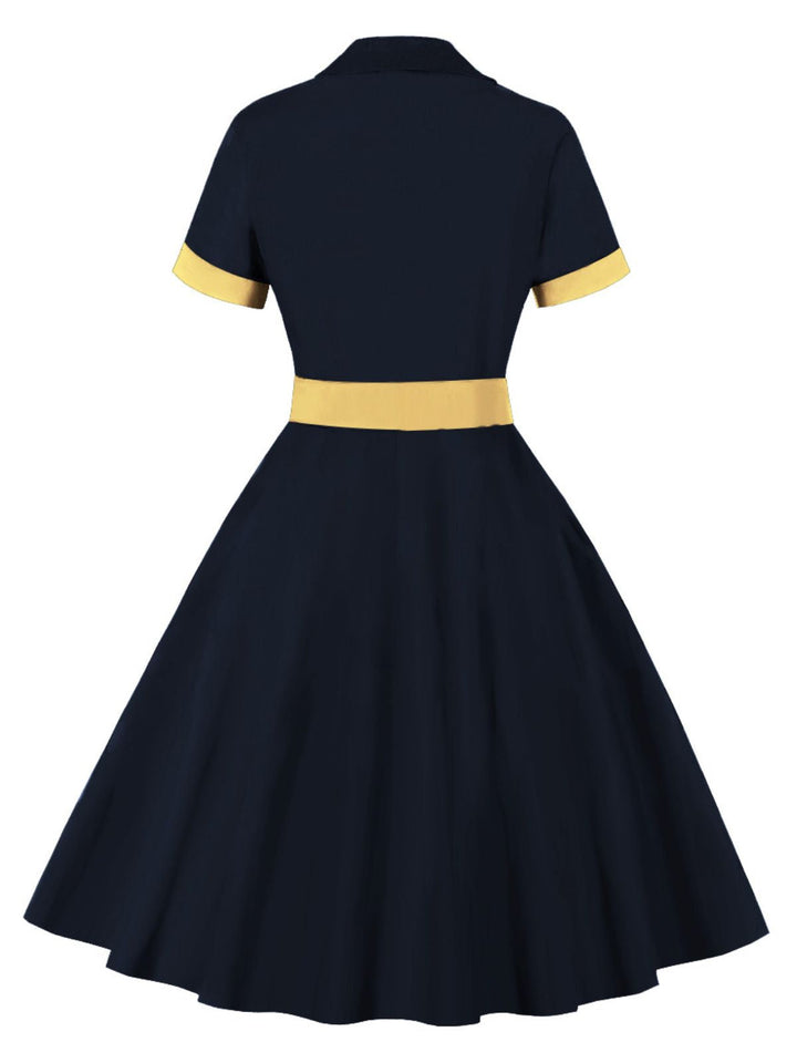 This 1950s Retro Contrast Short-Sleeved Lapel Dress wraps her in 1950s elegance, one twirl at a time