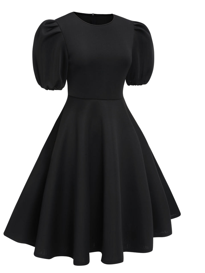 She slips into this 1950s Round Neck Puff Sleeve A-Line Dress and suddenly it&