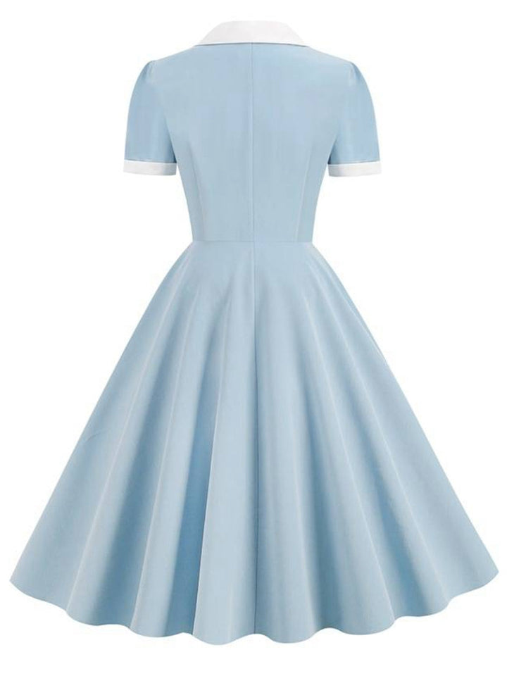 1950s Shirt Collar Buttons Swing Dress — the kind of 1950s dress that makes strangers smile