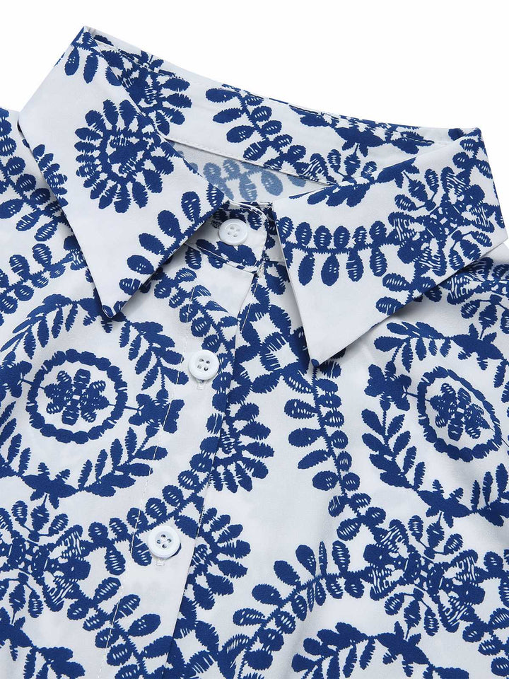 She pairs this 1950s Shirt Neck Print Belted Romper with confidence and 1950s charm