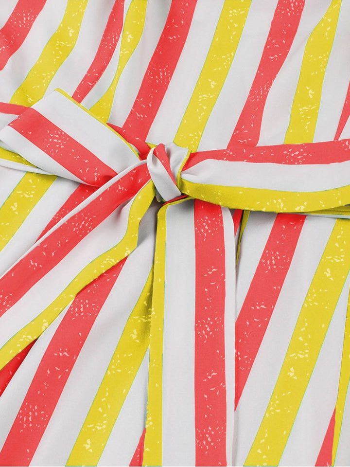 She slips into this 1950s Shoulder Tie Belted Stripes Dress and suddenly it&