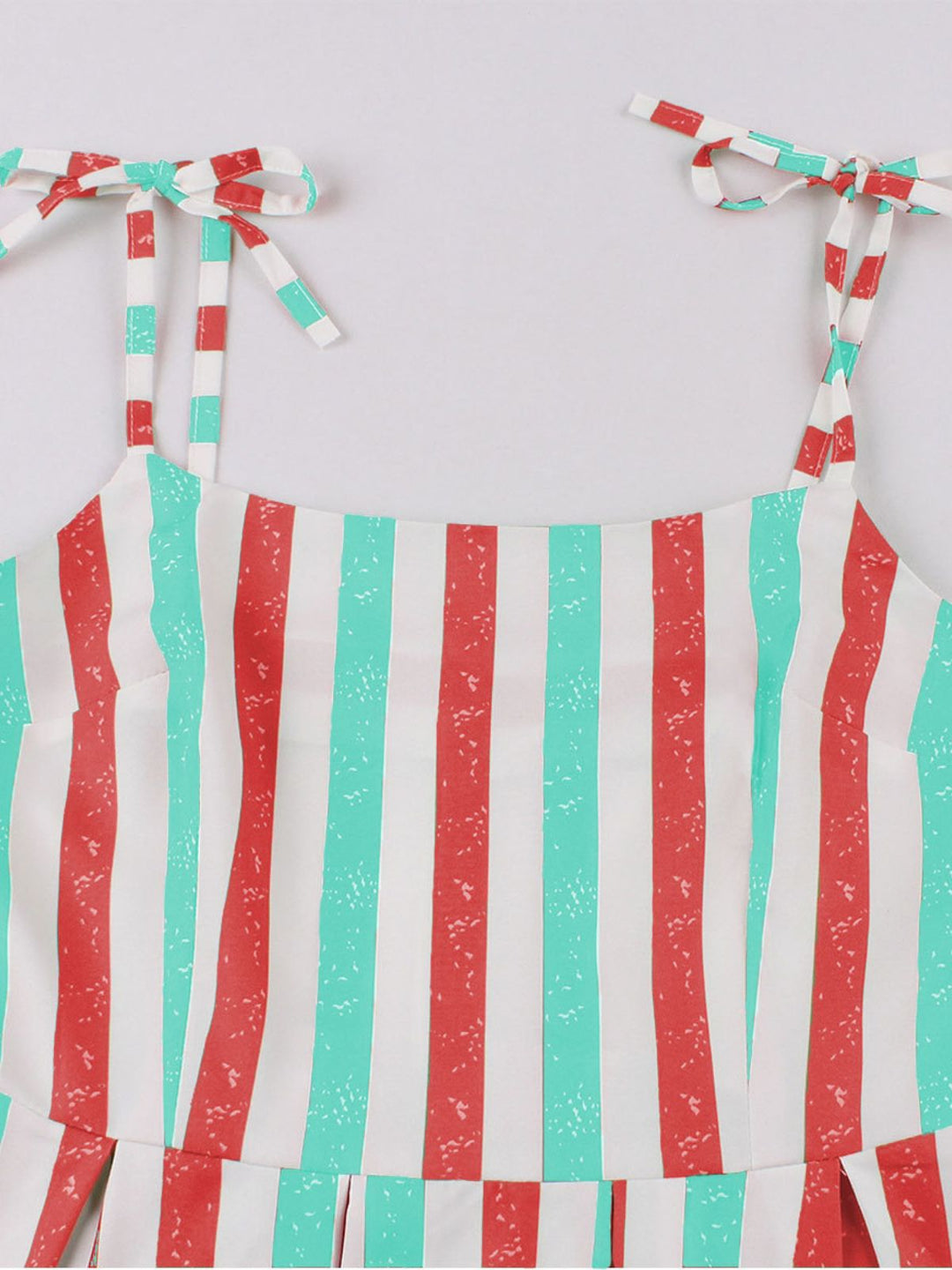 She slips into this 1950s Shoulder Tie Belted Stripes Dress and suddenly it&