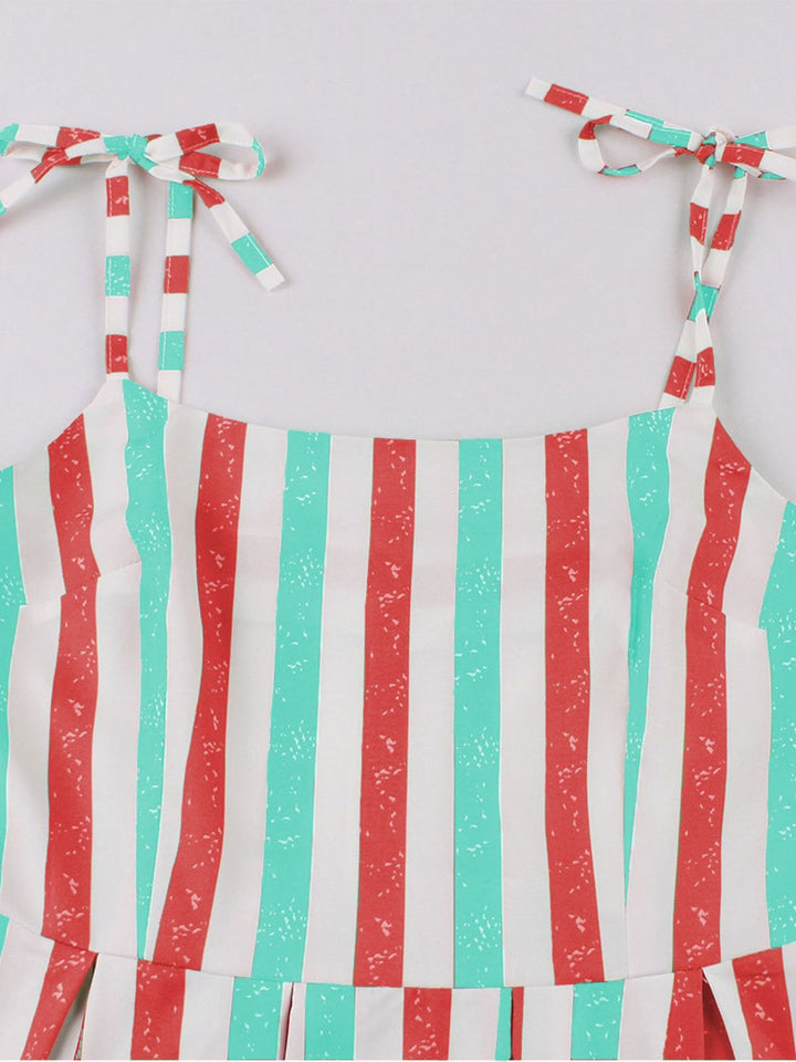 She slips into this 1950s Shoulder Tie Belted Stripes Dress and suddenly it&