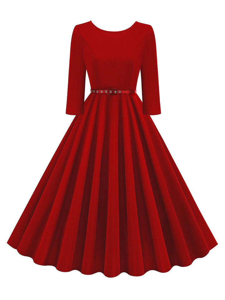 She slips into this 1950s Solid Belted Swing Dress and suddenly it&
