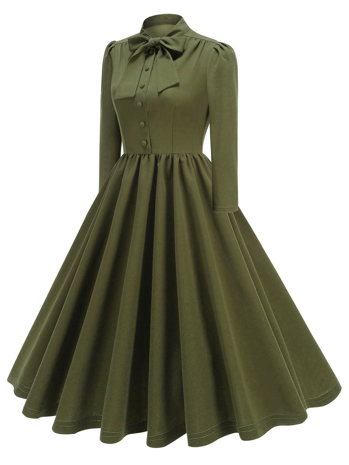 1950s Solid Bow Collar Buttoned Swing Dress — a 1950s silhouette that turns sidewalks into runways