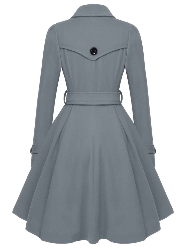 She throws on this 1950s Solid Color Lapel Slim Coat and the city feels like 1950s Paris