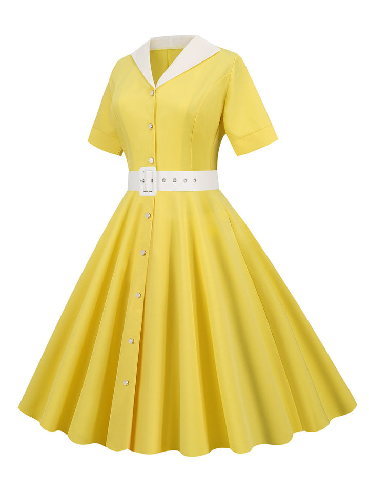 She slips into this 1950s Solid Contrast Lapel Belt Dress and suddenly it&