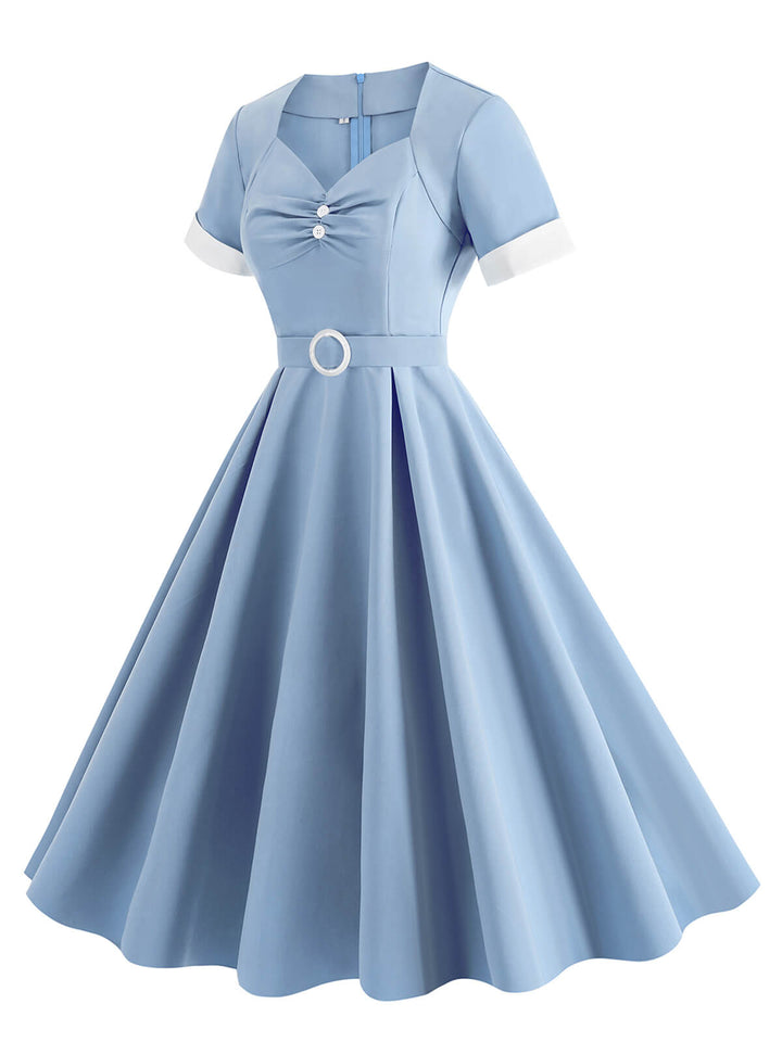 This 1950s Solid Contrast V-Neck Swing Dress wraps her in 1950s elegance, one twirl at a time