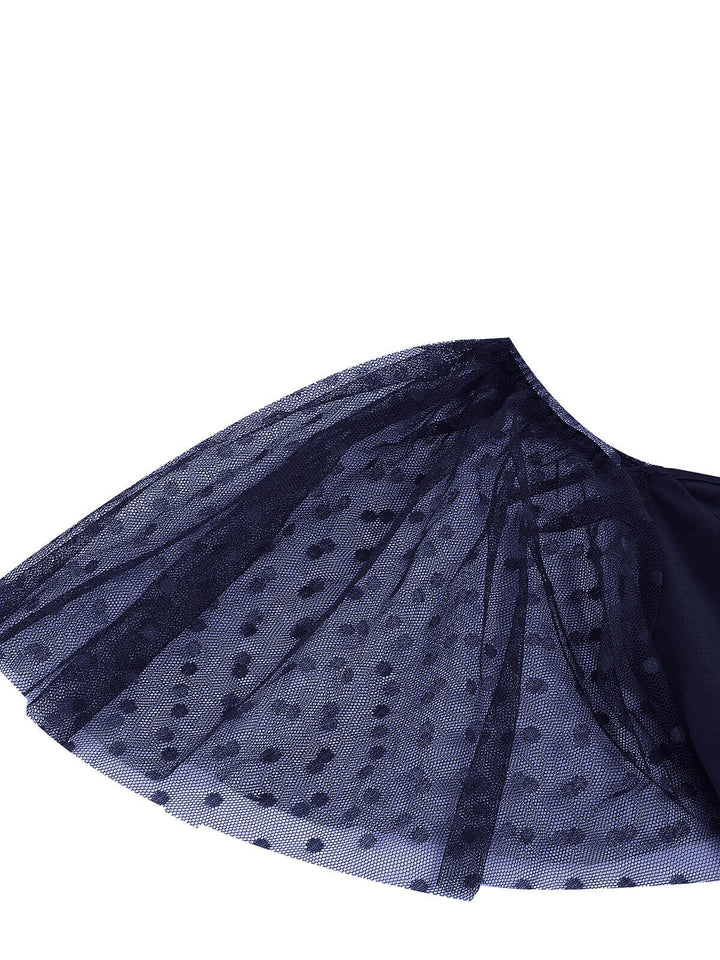 She slips into this 1950s Solid Dots Mesh Sleeve V-Neck Dress and suddenly it&