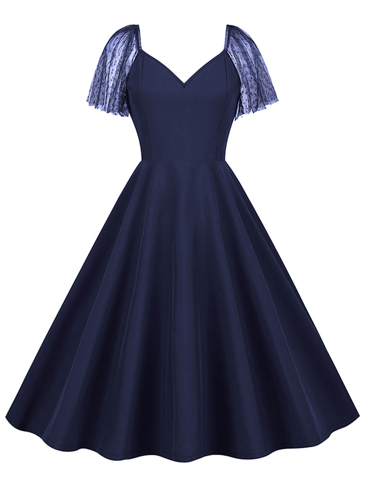 1950s Solid Dots Mesh Sleeve V-Neck Dress — the kind of 1950s dress that makes strangers smile