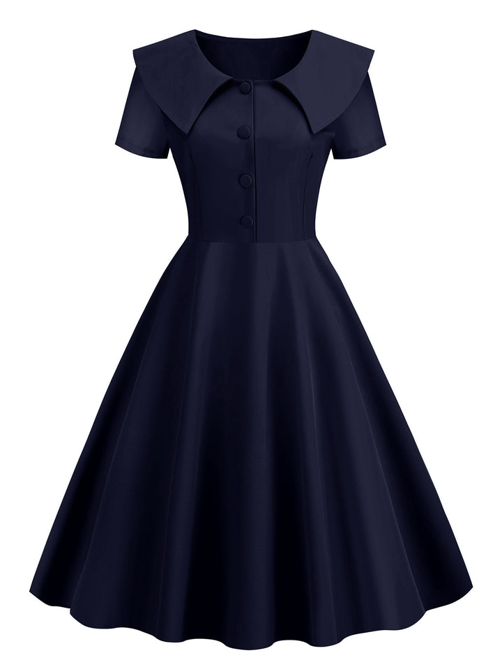 She slips into this 1950s Solid Lapel Swing Dress and suddenly it&