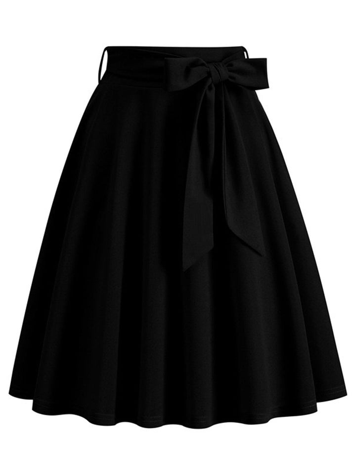 She sways in this 1950s Solid Waist Tie Swing Skirt and it&