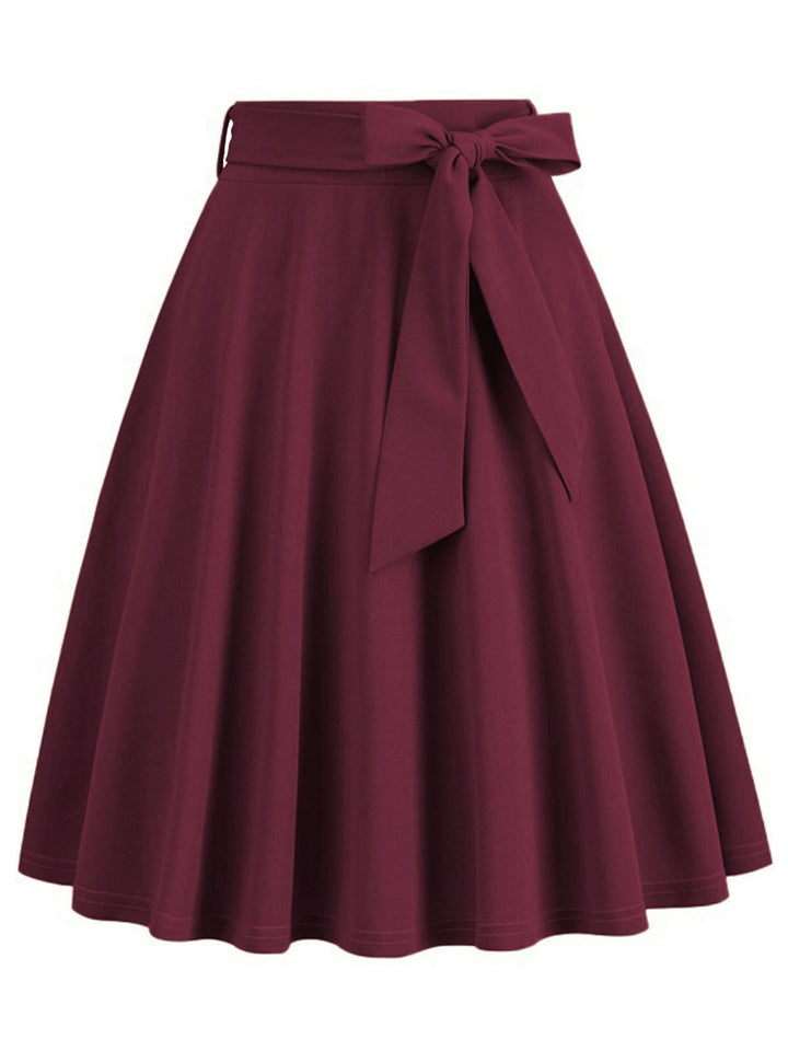 This 1950s Solid Waist Tie Swing Skirt spins 1950s stories with every step
