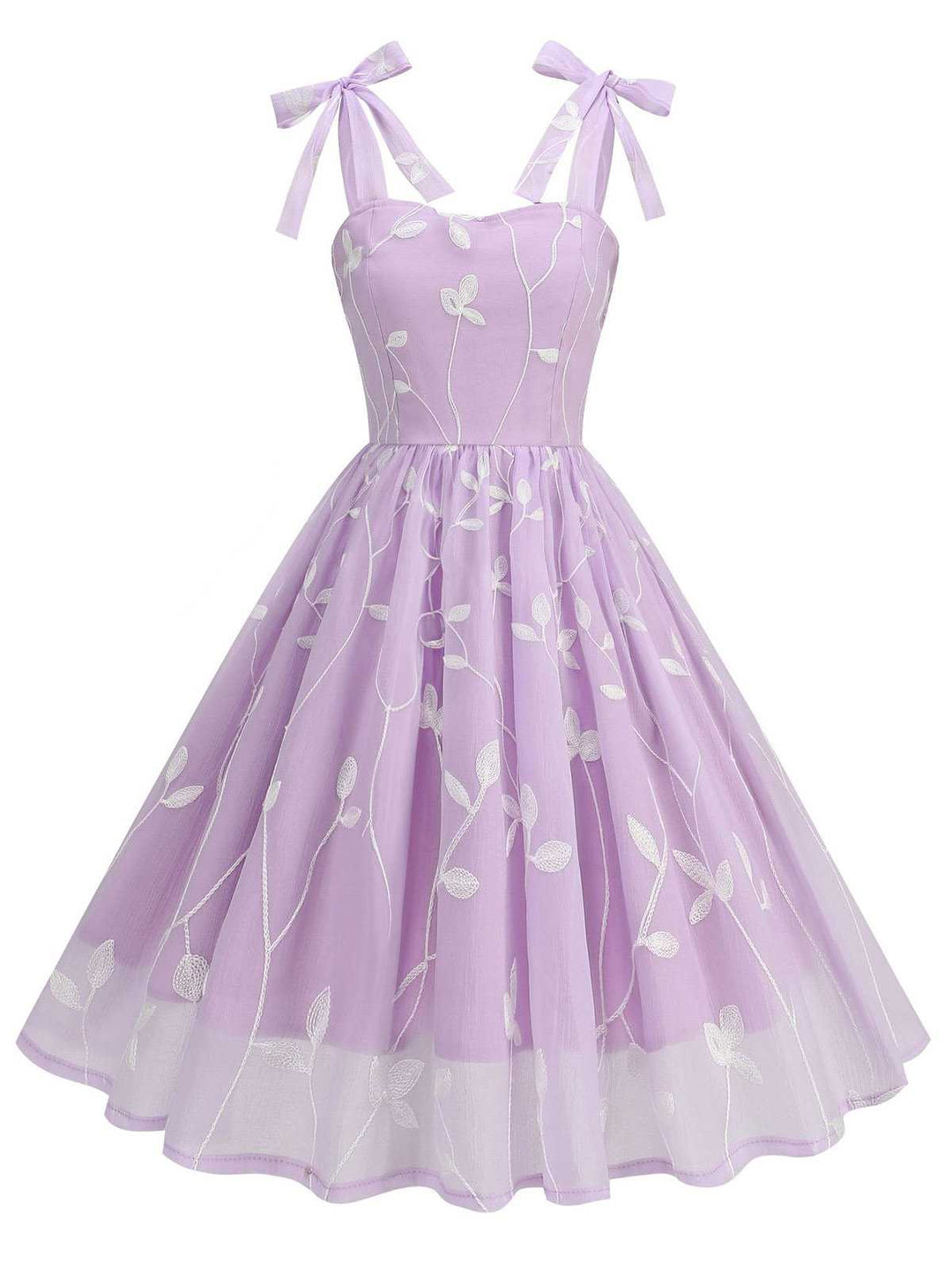 She slips into this 1950s Spaghetti Strap Bow Leaves Mesh Dress and suddenly it&