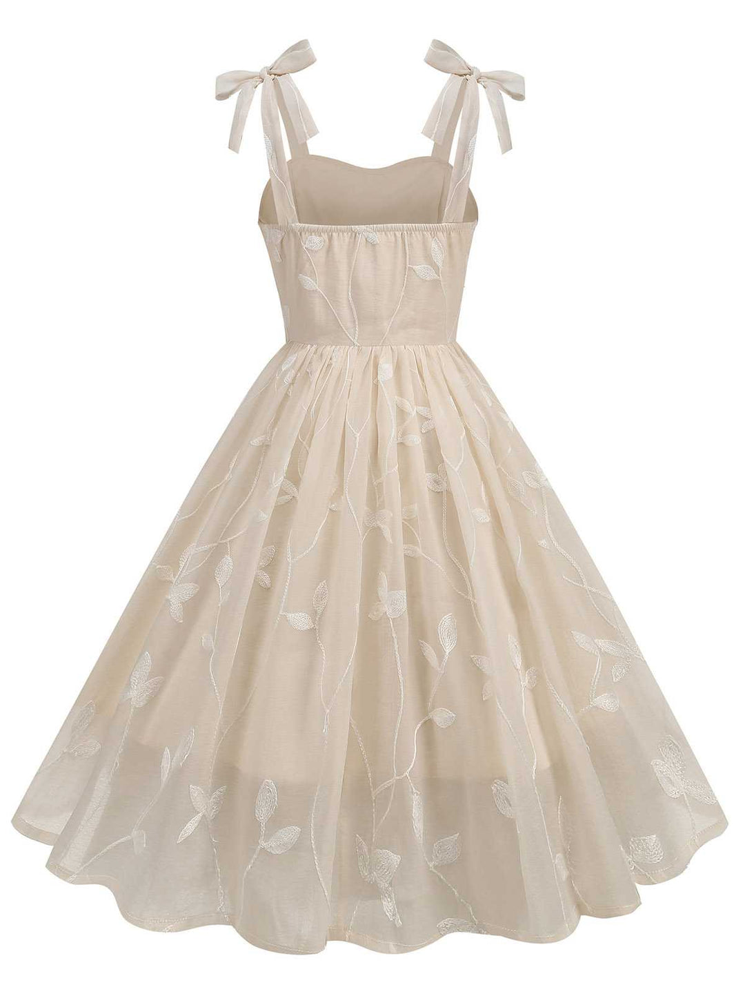 She slips into this 1950s Spaghetti Strap Bow Leaves Mesh Dress and suddenly it&