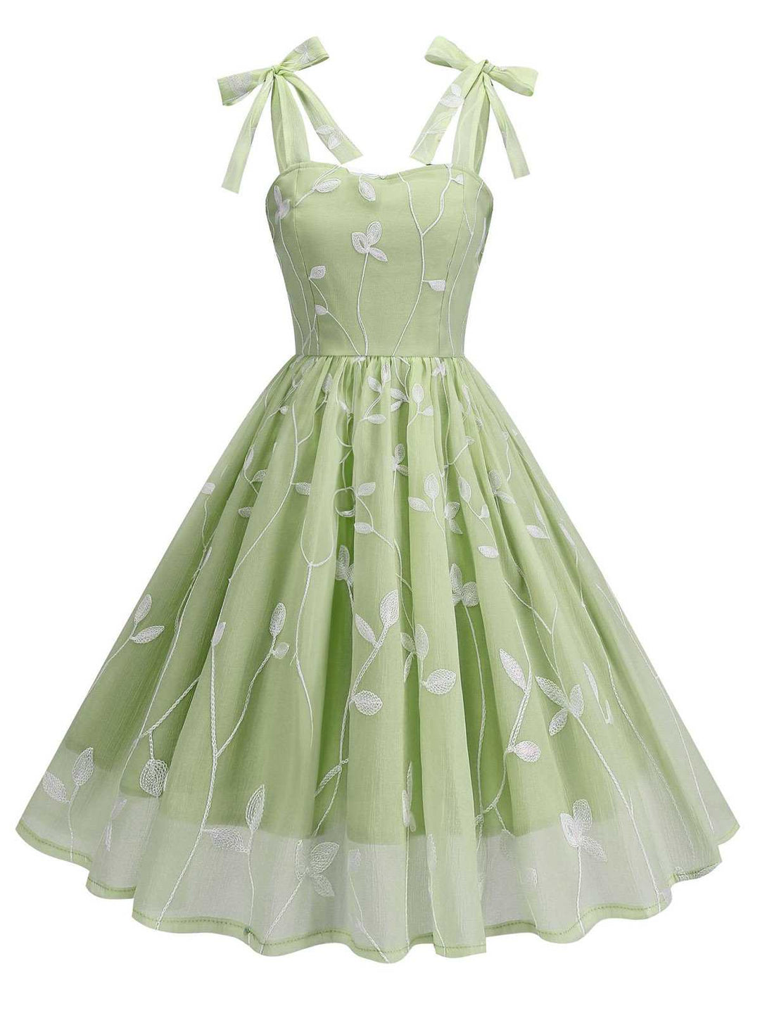 This 1950s Spaghetti Strap Bow Leaves Mesh Dress wraps her in 1950s elegance, one twirl at a time