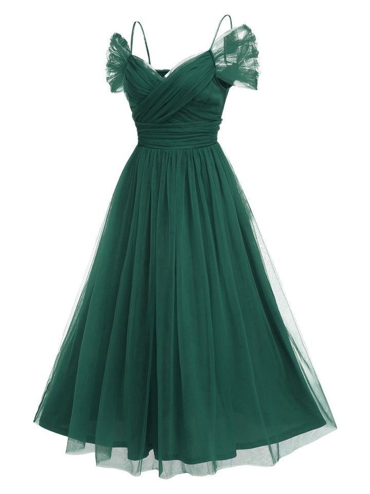 She slips into this 1950s Spaghetti Strap Off-Shoulder Mesh Dress and suddenly it&