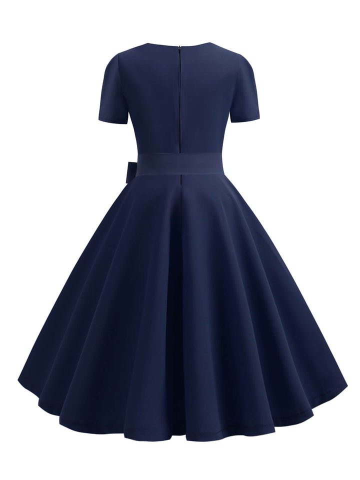 She slips into this 1950s Square Neck Short Sleeves Dress and suddenly it&
