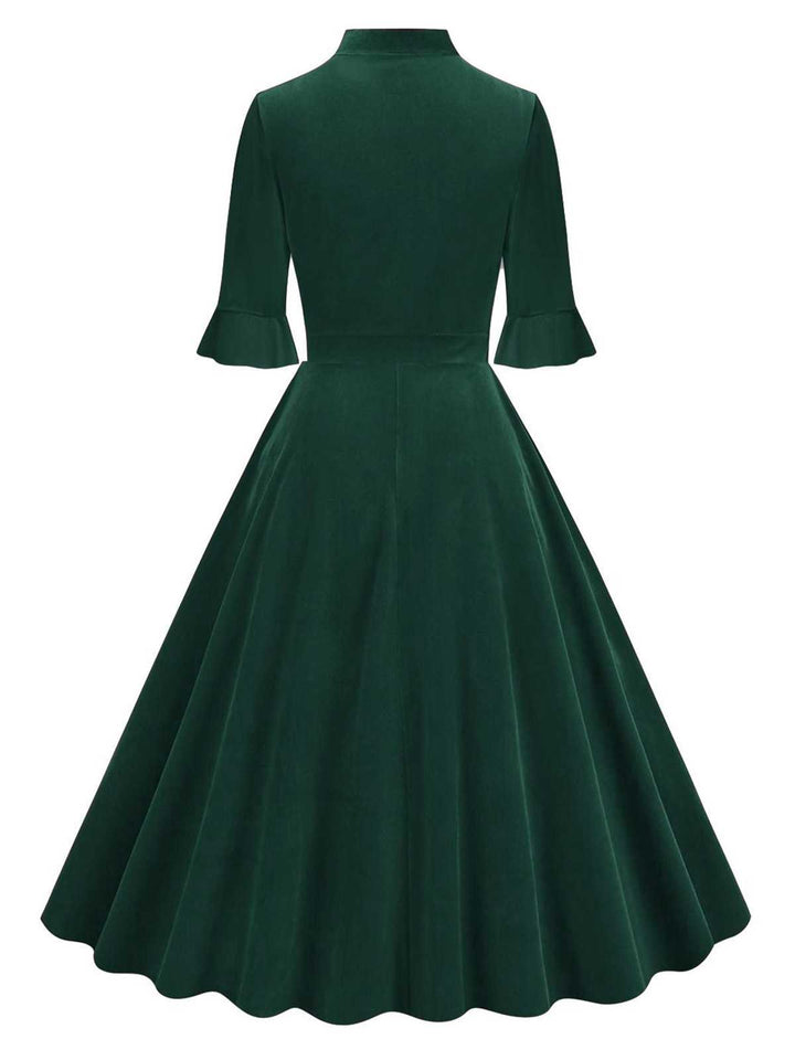 1950s Tie Neck Velvet Flared Sleeve Dress — a 1950