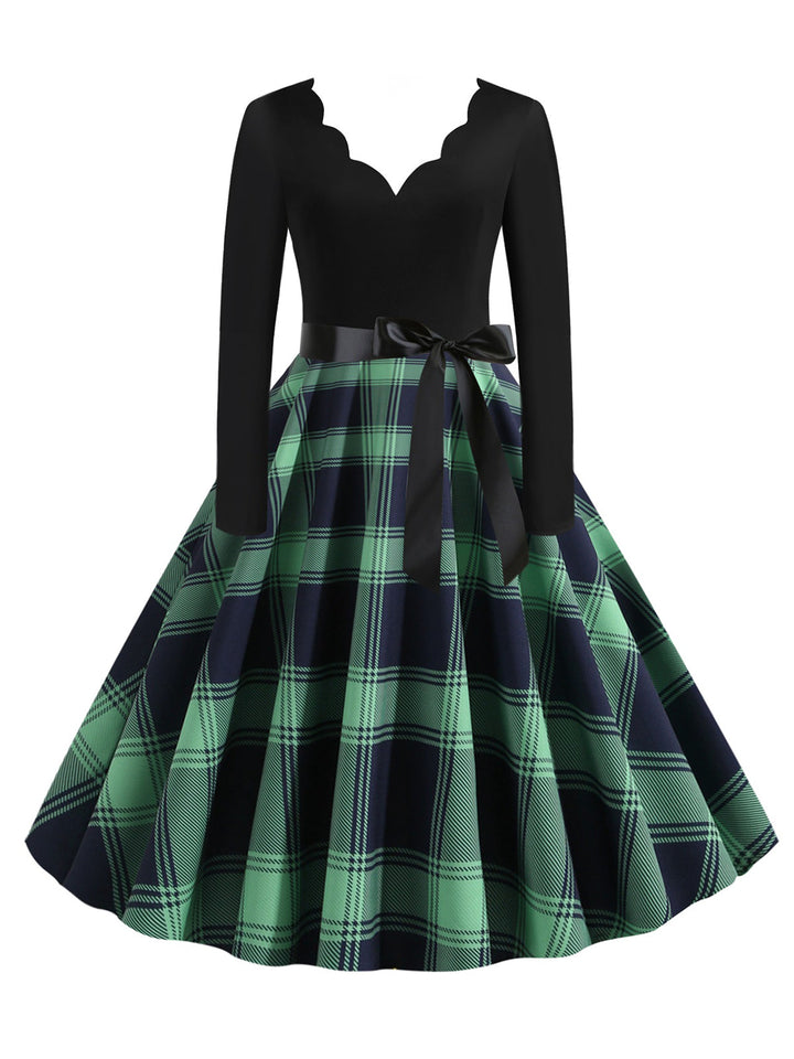 She slips into this 1950s V-Neck Long Sleeves Plaid Swing Dress and suddenly it&