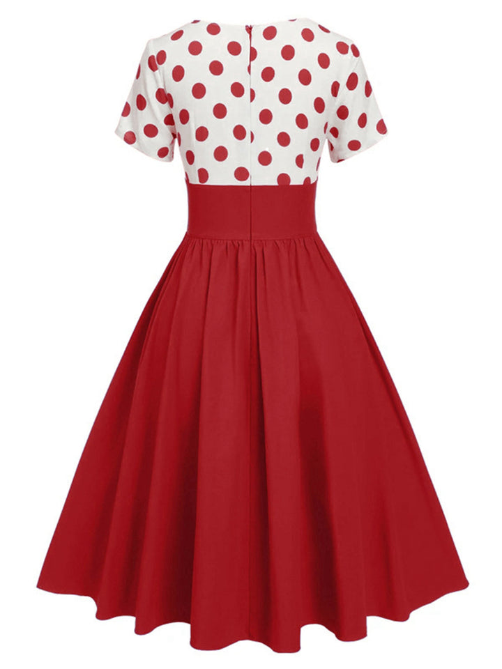 1950s V-Neck Polka Dots Swing Dress — the kind of 1950s dress that makes strangers smile