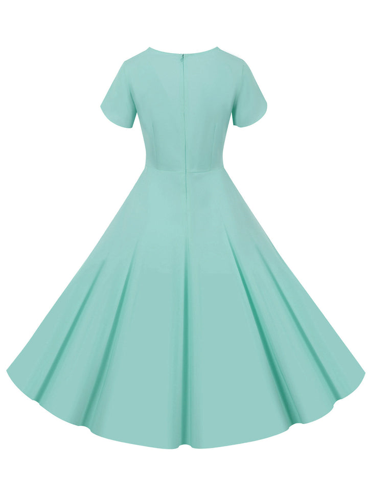 1950s V-Neck Single-Breasted Solid Dress — vintage elegance for the modern woman