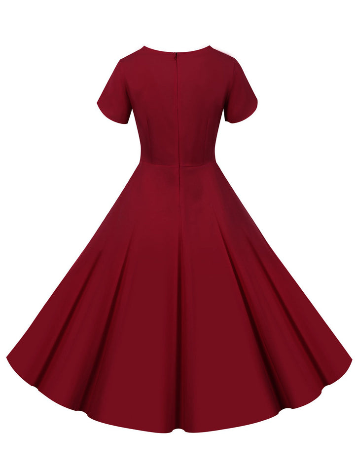 1950s V-Neck Single-Breasted Solid Dress — vintage elegance for the modern woman