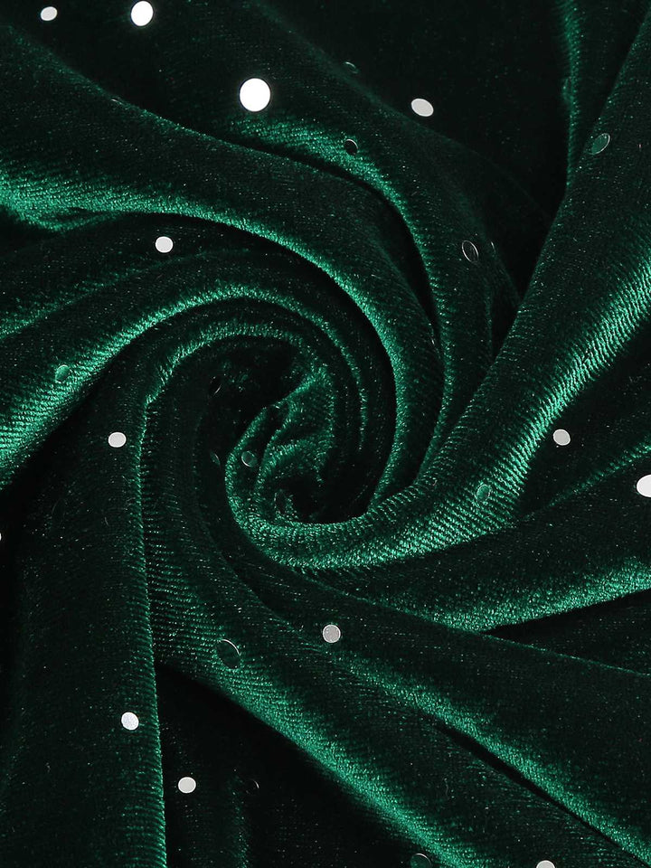 She slips into this 1950s Velvet Sparkling Solid A-Line Dress and suddenly it&
