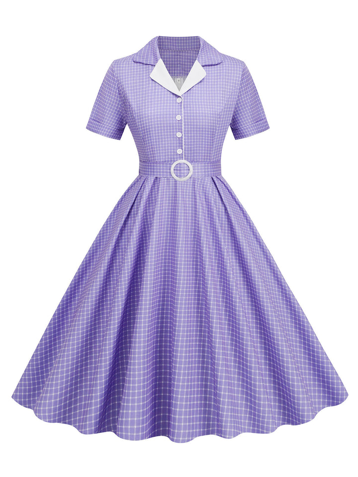 She slips into this 1950s Window Pane Plaid Lapel Swing Dress and suddenly it&